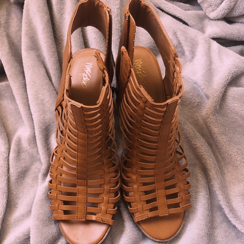 Open toed “leather” heels